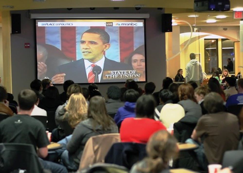 YET ANOTHER WATCH PARTY â€” AU students gathered in the Tavern Wednesday night to watch President Barack Obamaâ€™s first State of the Union address. Obama discussed the economy, health care and foreign policy but failed to mention D.C. voting rights despite entreaties from local residents.