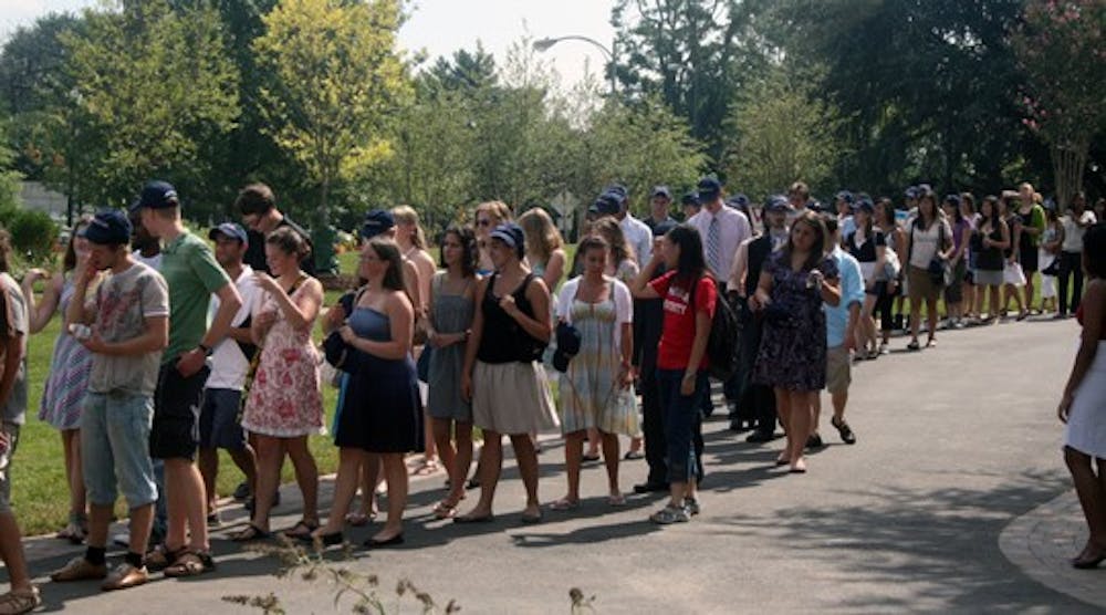 NEW TRADITIONS â€“ The class of 2013 marches to Bender Arena at the start of Friday\'s convocation ceremony. The university hopes the new format of the convocation will be the start of a tradition.