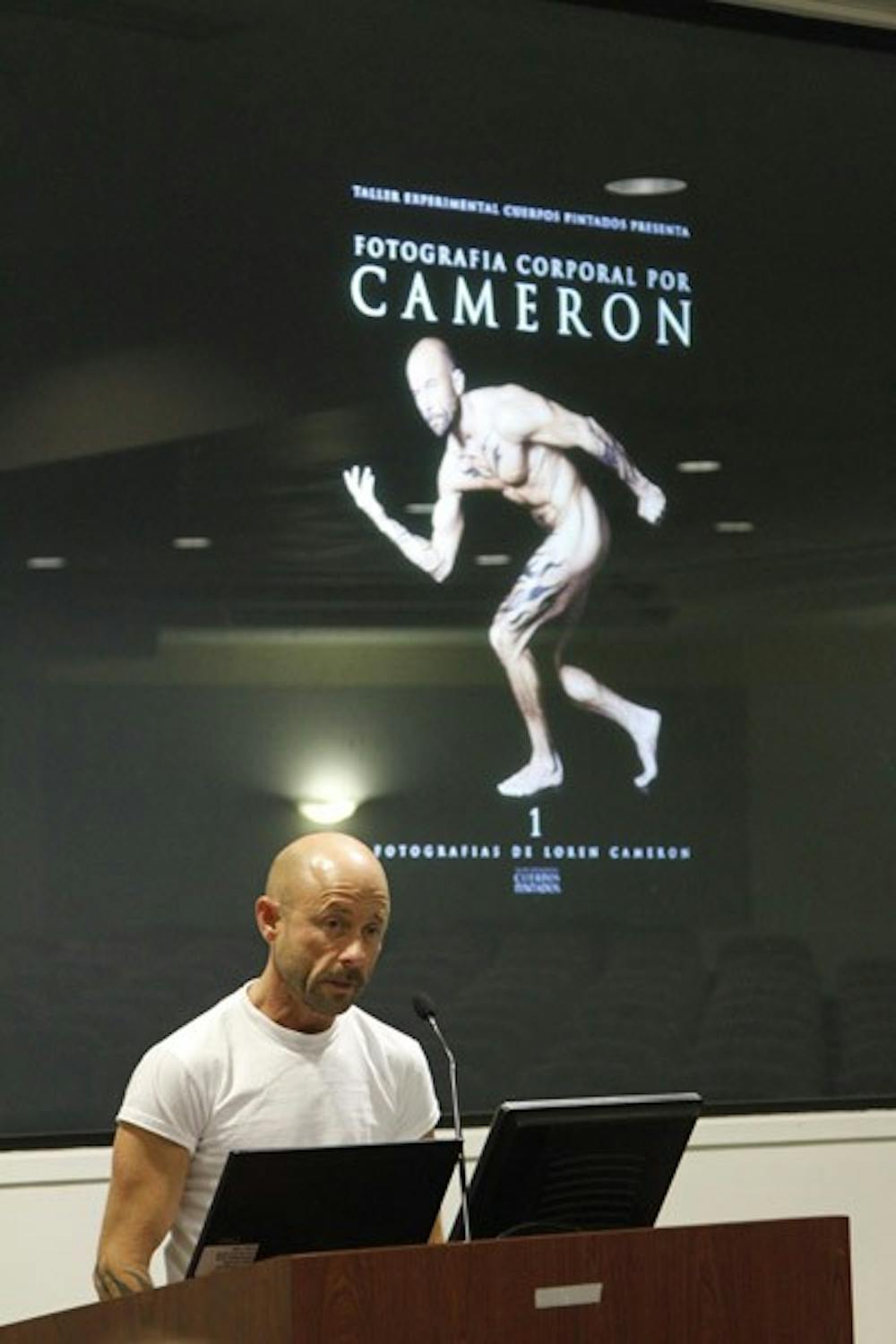COMING INTO FOCUS â€” Loren Cameron gave a presentation in Ward on Tuesday night about growing up as a lesbian and his journey to becomeing a transgender man. He also showed his photography of trans-men and women 