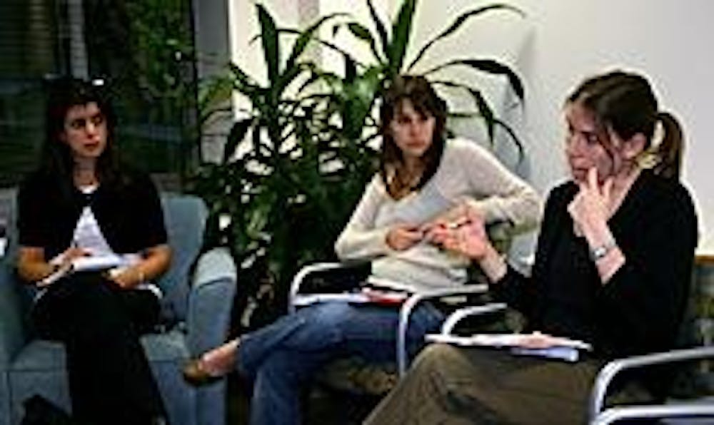 Shannon Murphy, SOC graduate student Julia Dahl and Kathy Haldeman discuss Plan B at an information session Tuesday.