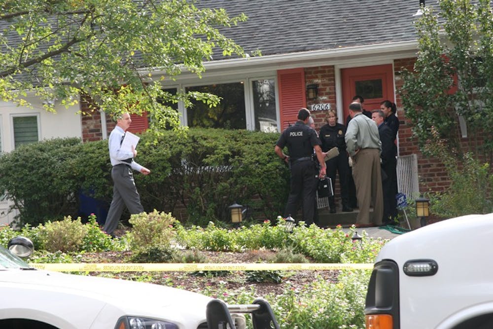 Police investigate the death of Kogod professor Sue Marcum in front of her house in Bethesda, Md.