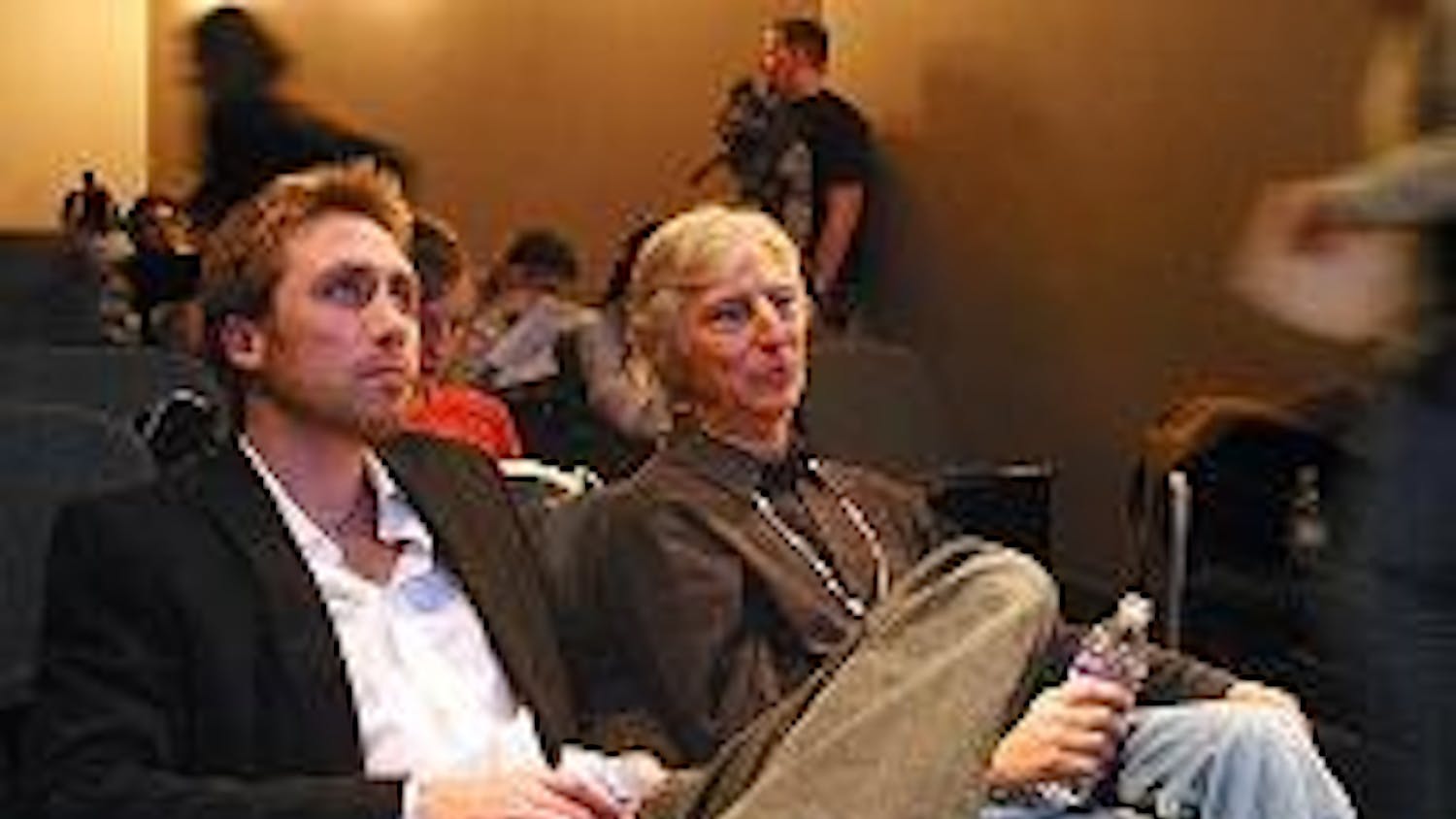 Philippe Cousteau, left, and David Helvarg, president of Blue Frontier Campaign, wait for the films to start.
