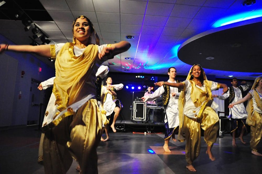 DANCING THE NIGHT AWAY â€“ AUâ€™s bhanga team performs as part of the Stay-Awake-a-Thon on March 25. More than 100 students attended the event, raising more than $2,000 for charity.