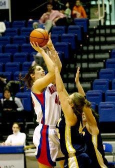  Abby Lipskis takes a shot against Navy.