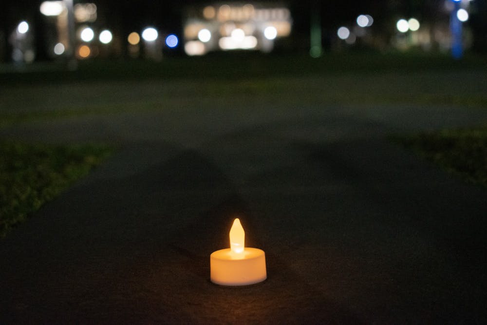 Students gather to honor Disability Day of Mourning at candlelight vigil