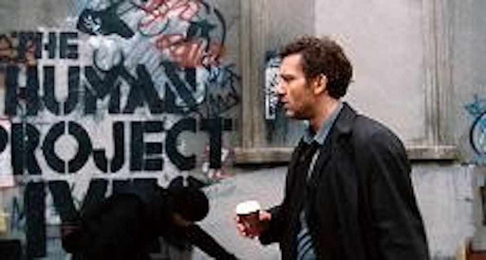 Clive Owen fights to save a pregnant woman in Alfonso CuarÃ‚Â¢n's dystopian science fiction film 'Children of Men.'