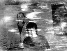 A documentary served as the background for Jason Hutto's and Laura Harris' performance. 