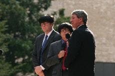 LAST LAUGH - Capitol Steps' Mike Thornton impersonates President Bush struggling with a language barrier while speaking to two Chinese men, played by Jack Rowles and Evan Casey. The group played Sunday night at the Woods-Brown Ampitheatre to kick of the K