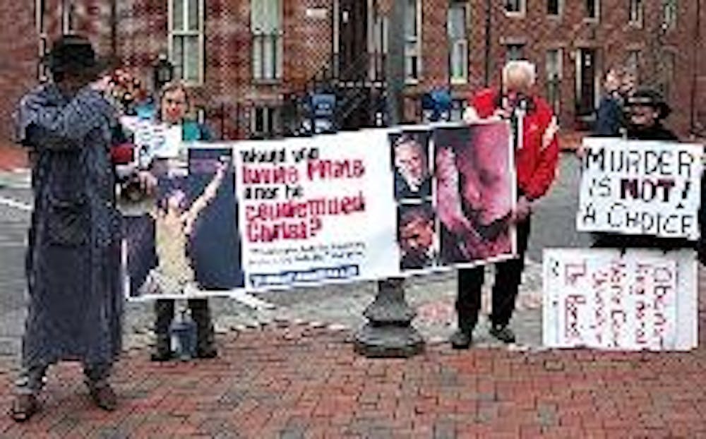 GETTING HEARD - Anti-abortion activists from the organization Women Against the Killing and Exploitation of Unprotected Persons protested Obama's presence at Georgetown University Tuesday afternoon. They believed a president who supports abortion rights s