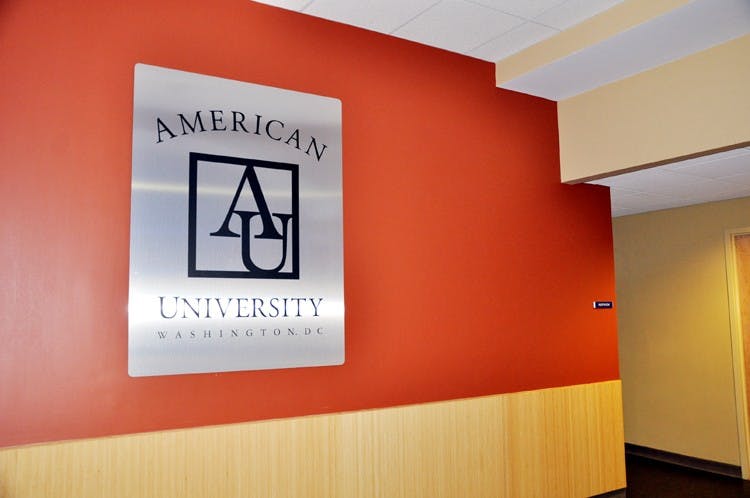 SIGNS OF THEFT â€” The University replaced letters with a logo sign in response to repeated thefts near the elevators in the MGC lobby.