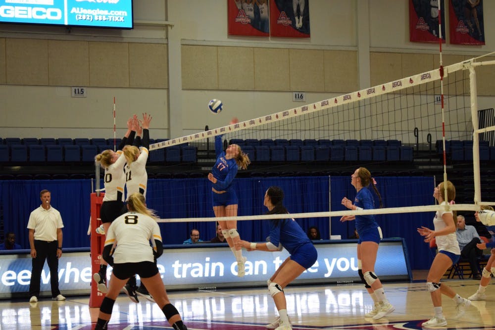 Freshman outside hitter Helena Elbaek goes up for a kill in the Eagles match against Iowa on Sept. 16