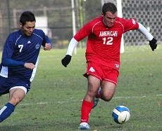 No. 12 Phillip Purdy dribbles down the field in Tuesday's loss.
