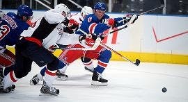 FIGHTING BACK FOR A WIN - Washington center David Steckel battles for the puck with Sean Avery during the Capitals 5-3 win. The victory evens the series at 3-3 with the final game at the Verizon Center on Tuesday. Avery had been scratched in Game 5 due to