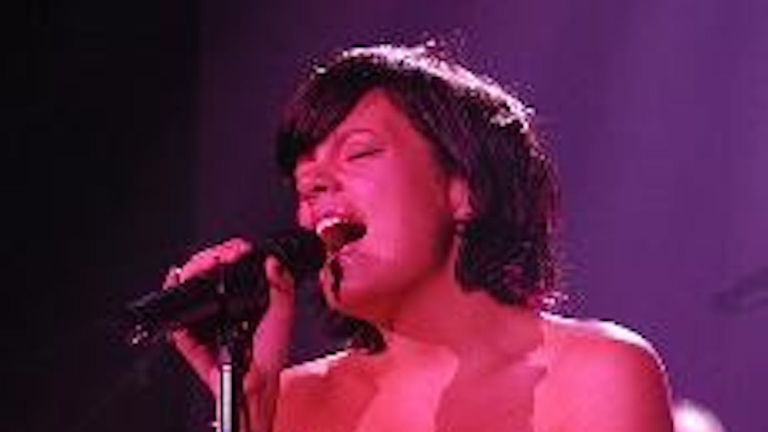 SMILE - Brit sensation Lily Allen performed at the 9:30 club Friday night to a sold-out crowd. Allen put on a lively show featuring a number of her hit songs alongside some new material. The opening act, Natalie Portman's Shaved Head, provided a unique so