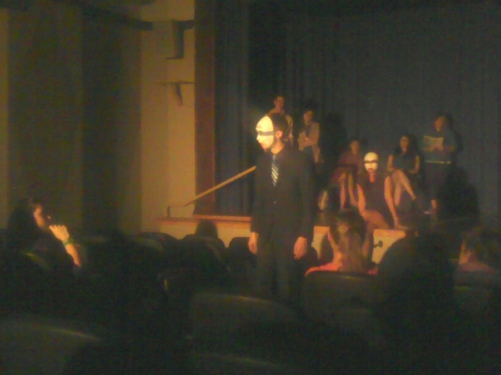 	College of Arts and Sciences sophomore Brian Rhoades (center) plays Father in the play.