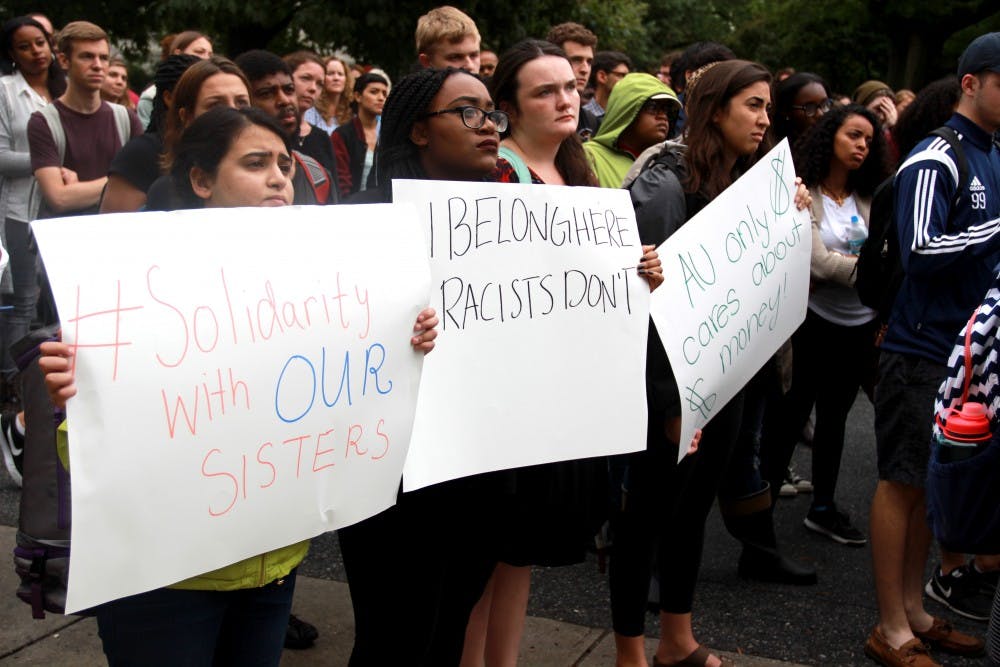 Students protest at the&nbsp;#SolidaritywithourSisters rally on the steps of MGC in September 2016.&nbsp;Hundreds gathered to speak out against racism on AU's campus.