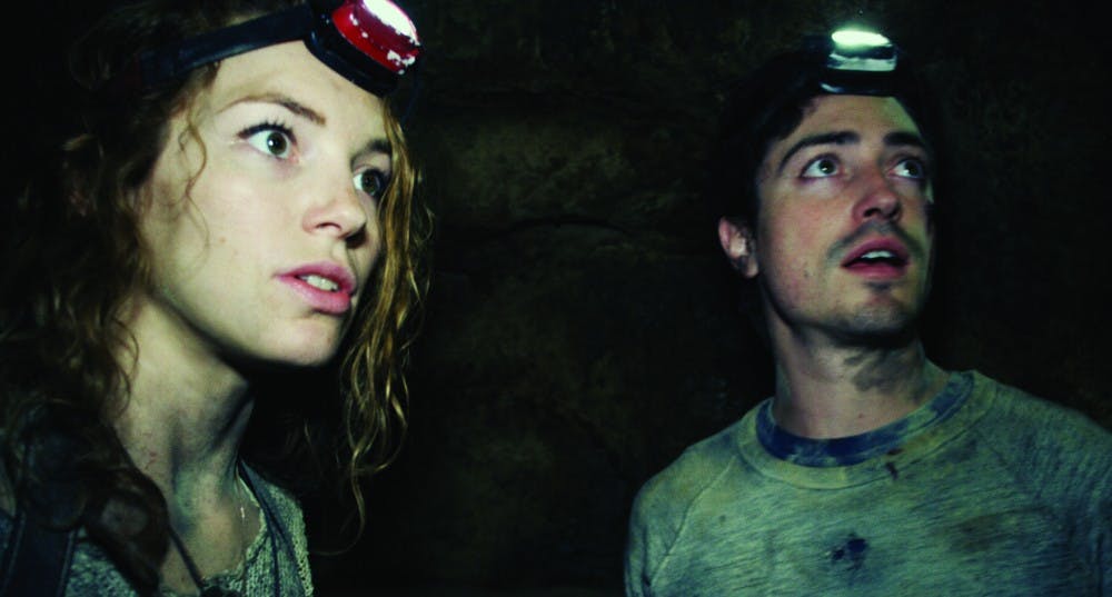 Scarlett (PERDITA WEEKS) and George (BEN FELDMAN) traverse miles of twisting catacombs beneath the streets of Paris in "As Above/So Below".  A journey into madness and terror, "As Above/So Below" reaches deep into the human psyche to reveal the personal demons that come back to haunt us all.  