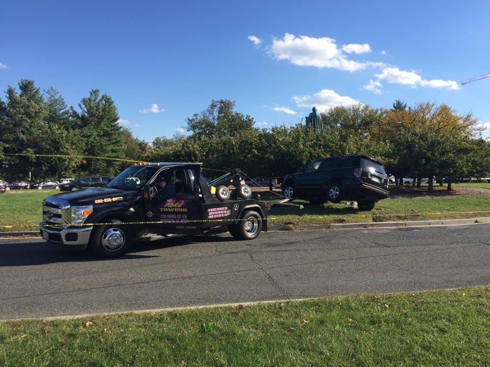 Car flips in Ward Circle in the middle of afternoon traffic