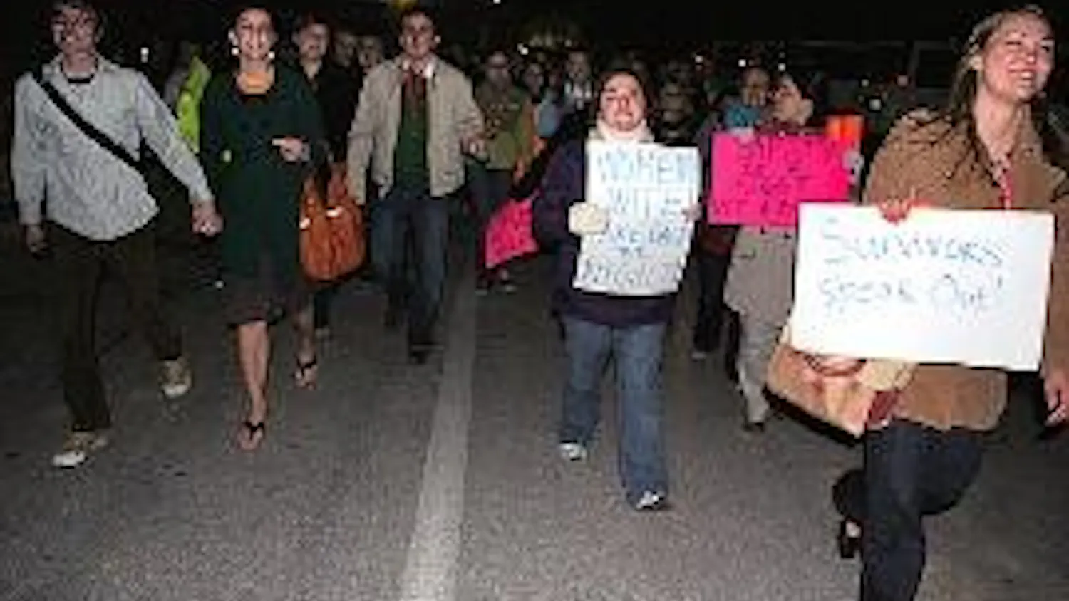 \"STOP THE VIOLENCE, STOP THE RAPE\" - Students marched through campus Tuesday night, chanting in protest of violence against women. Event participants then finished the night by sharing personal stories in the Kay Spiritual Life Center.
