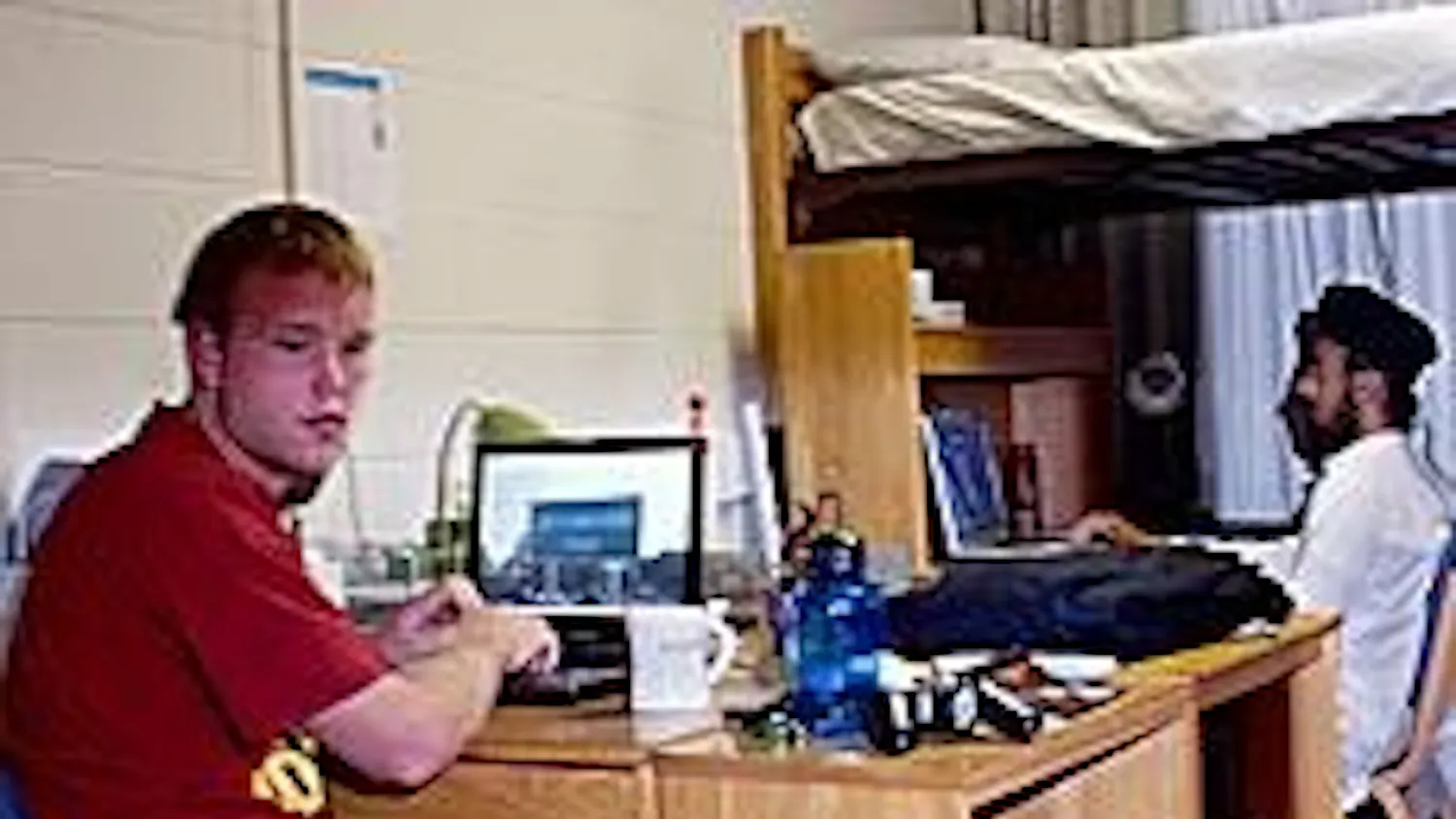 Freshmen Ryan Pickett, left, and Pavneet Singh work in their cramped triple on the fifth floor of Letts Hall.