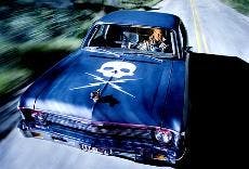 Kurt Russell plays a psycho killer chasing Rosario Dawson in "Death Proof," the second-half of this double feature film.  