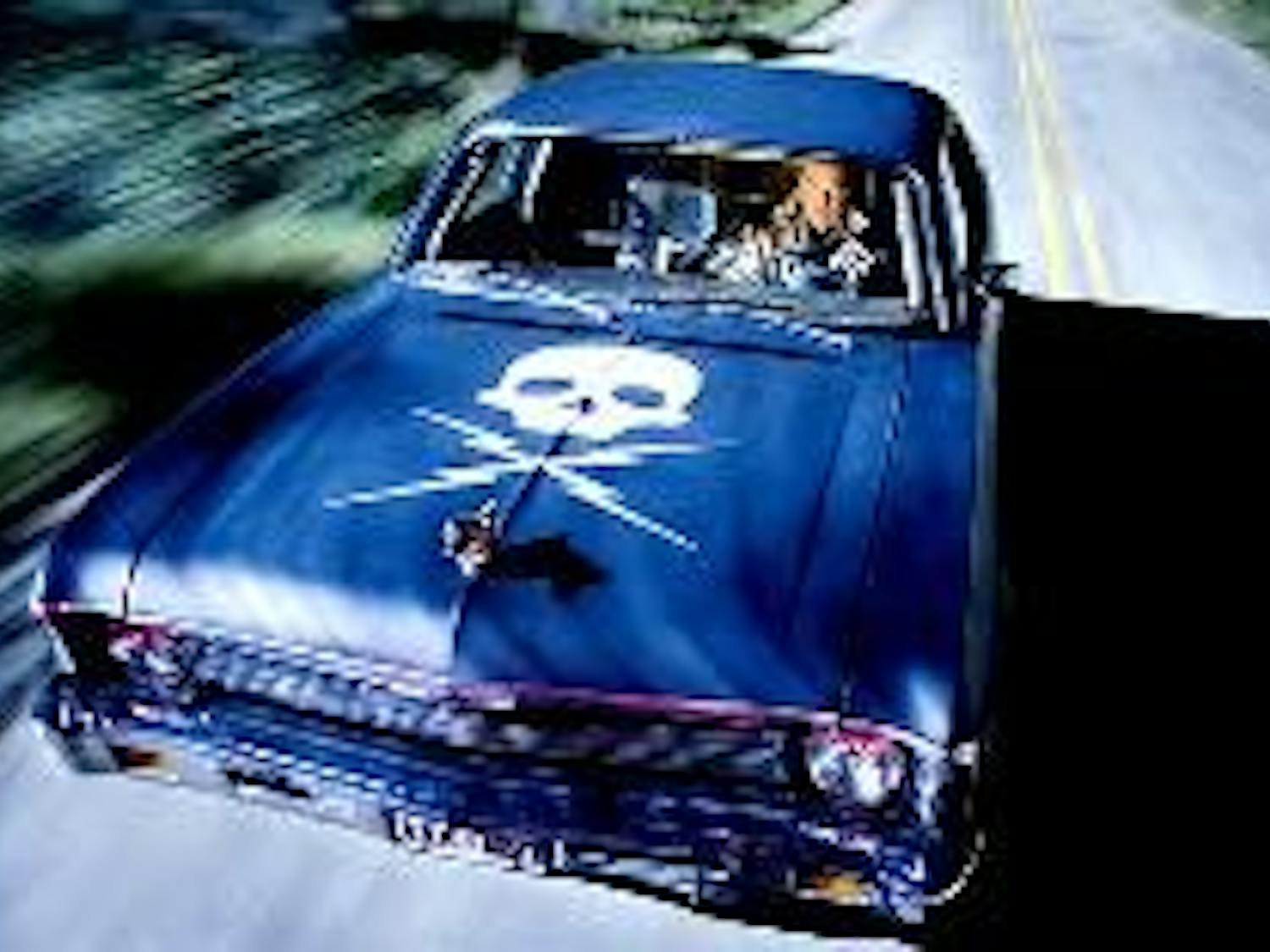 Kurt Russell plays a psycho killer chasing Rosario Dawson in "Death Proof," the second-half of this double feature film.