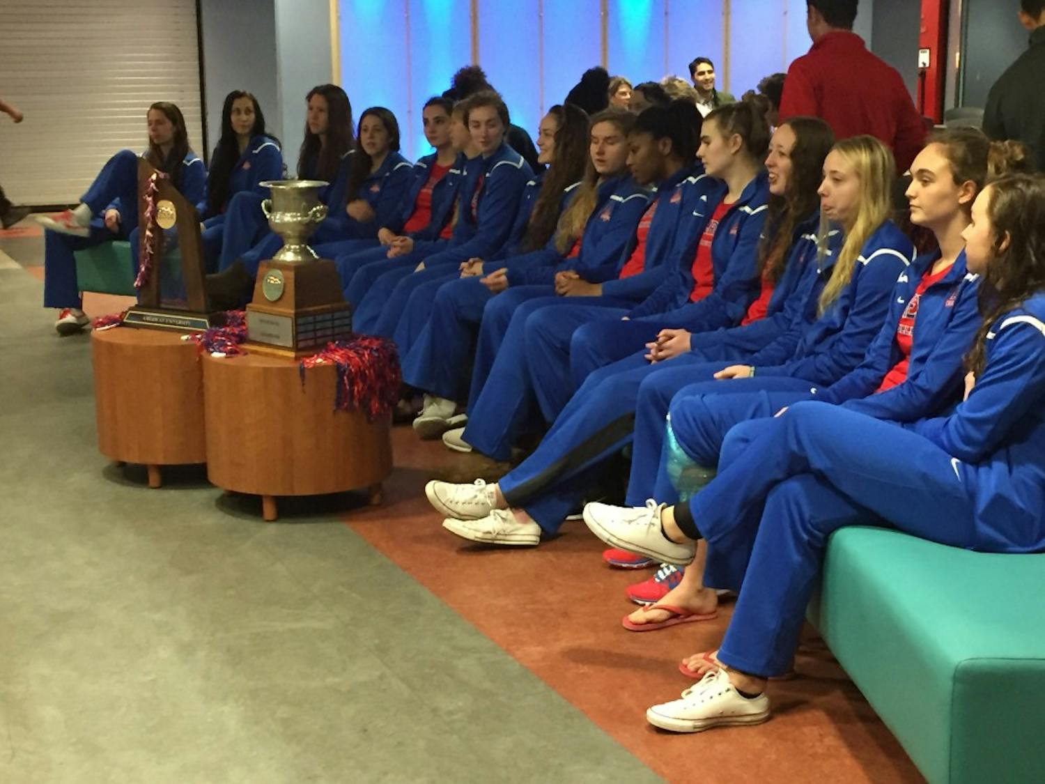 AU volleyball players watch carefully as the NCAA tournament seeds are announced.&nbsp;