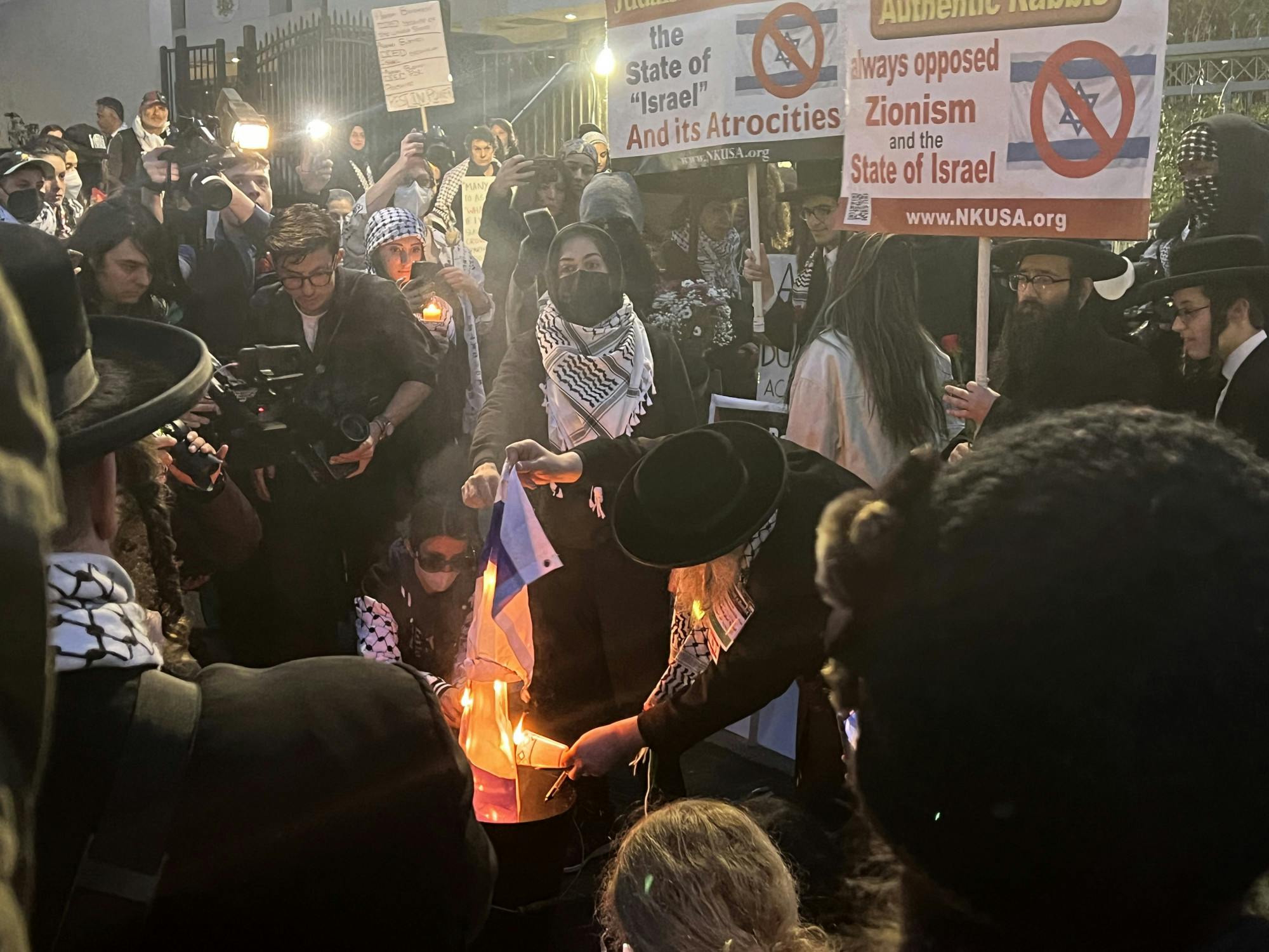 israel embassy protest flag burning pic - The Eagle