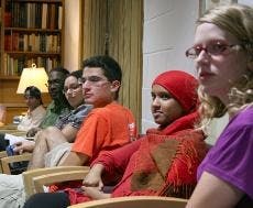 MIXING IT UP- Students gather in the basement of Kay Spiritual Life Center for a discussion to increase diversity within the SG. Topics included minority representation and multicultural initiatives.