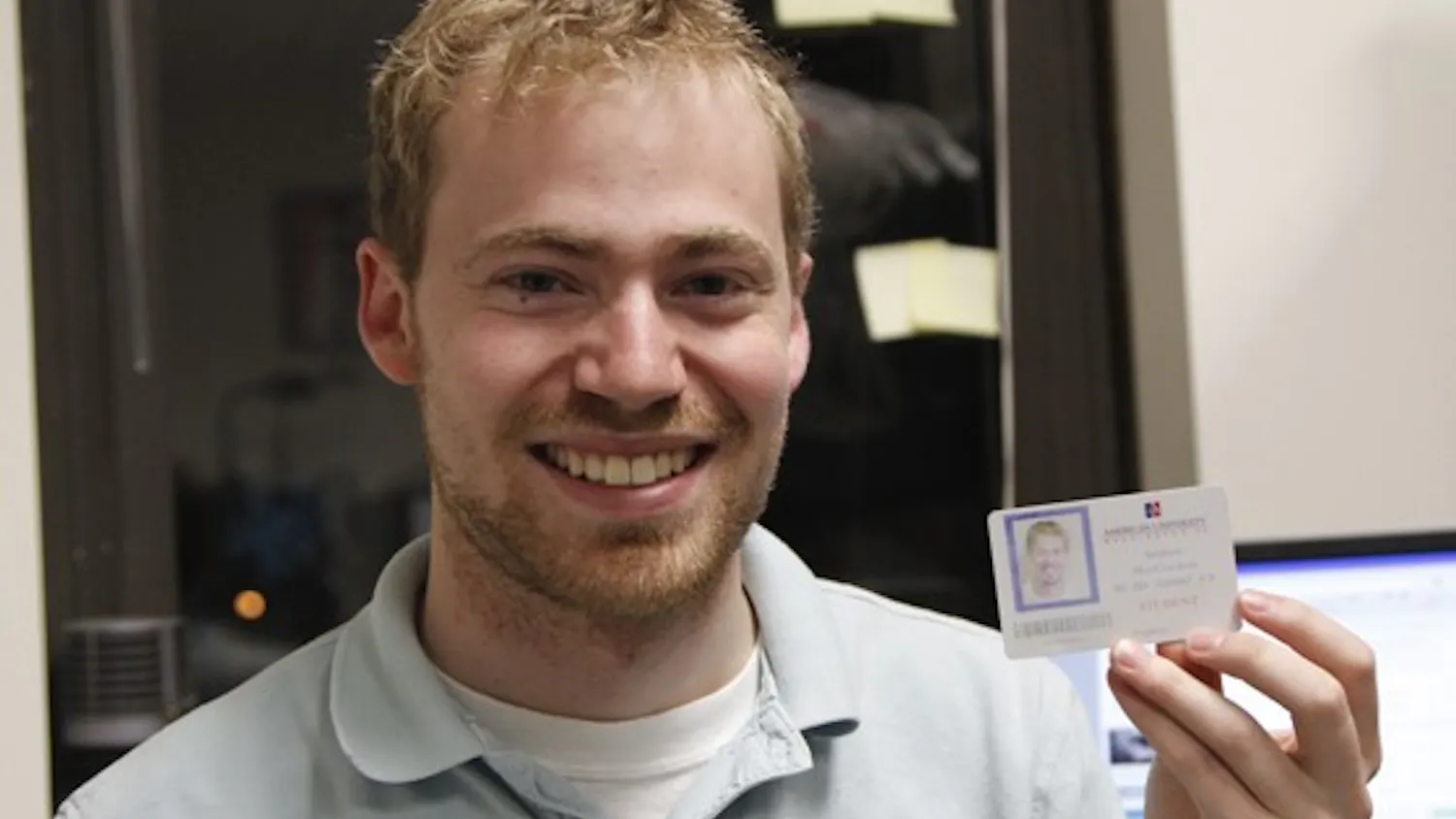 HEY, CHECK THIS OUT! — SG President Andy MacCracken has worked tirelessly this year to introduce combination AUID-SmarTrip cards for students. A test program was recently expanded from 20 IDs to 300. Above, MacCracken shows off his own hybrid-card.