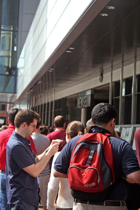 AROUND THE NATION IN 50 HEADLINES â€” Passers-by check out the Newseumâ€™s outdoor display of front pages from newspapers around the country. The Newseum opened its D.C. location in April 2008.