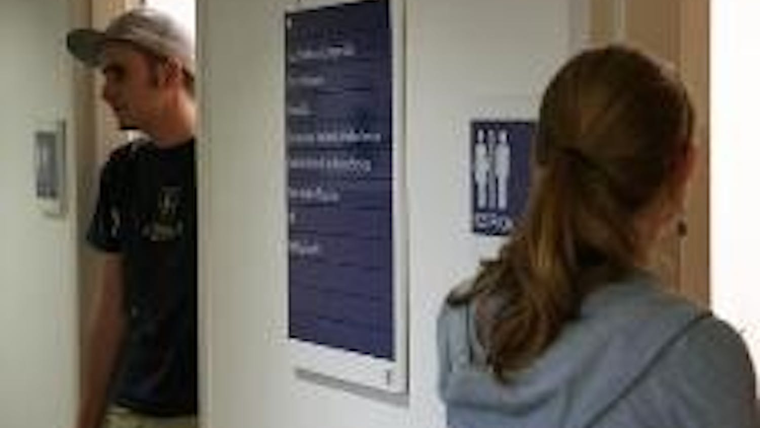 NEUTRAL BATHROOMS - As part of the D.C. regulations implemented last year, single-room bathrooms must be gender neutral. The GLBTA Resource Center and AU Queers and Allies have been working to change the signs. As seen here, males and females can use each