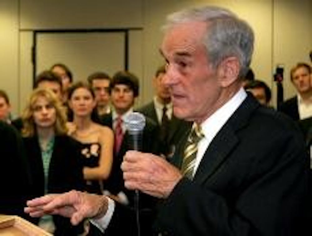RAISING FUNDS - Rep. Ron Paul, R-Texas, speaks Wednesday night at a College Republicans' fundraiser. The Republican presidential hopeful raised many issues, including legalizing medicinal marijuana.