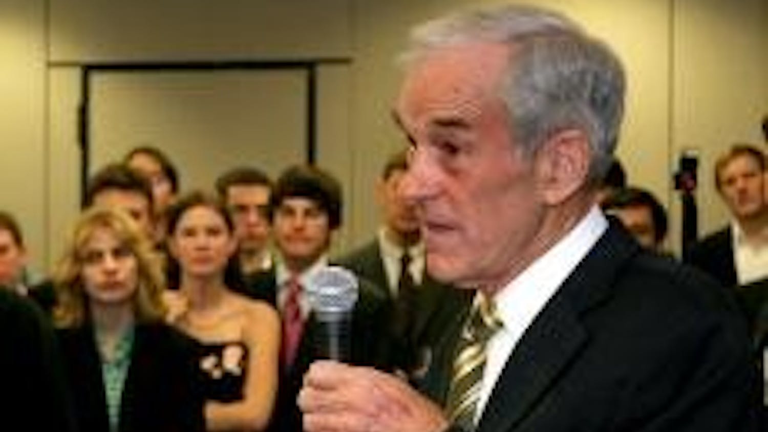RAISING FUNDS - Rep. Ron Paul, R-Texas, speaks Wednesday night at a College Republicans' fundraiser. The Republican presidential hopeful raised many issues, including legalizing medicinal marijuana.