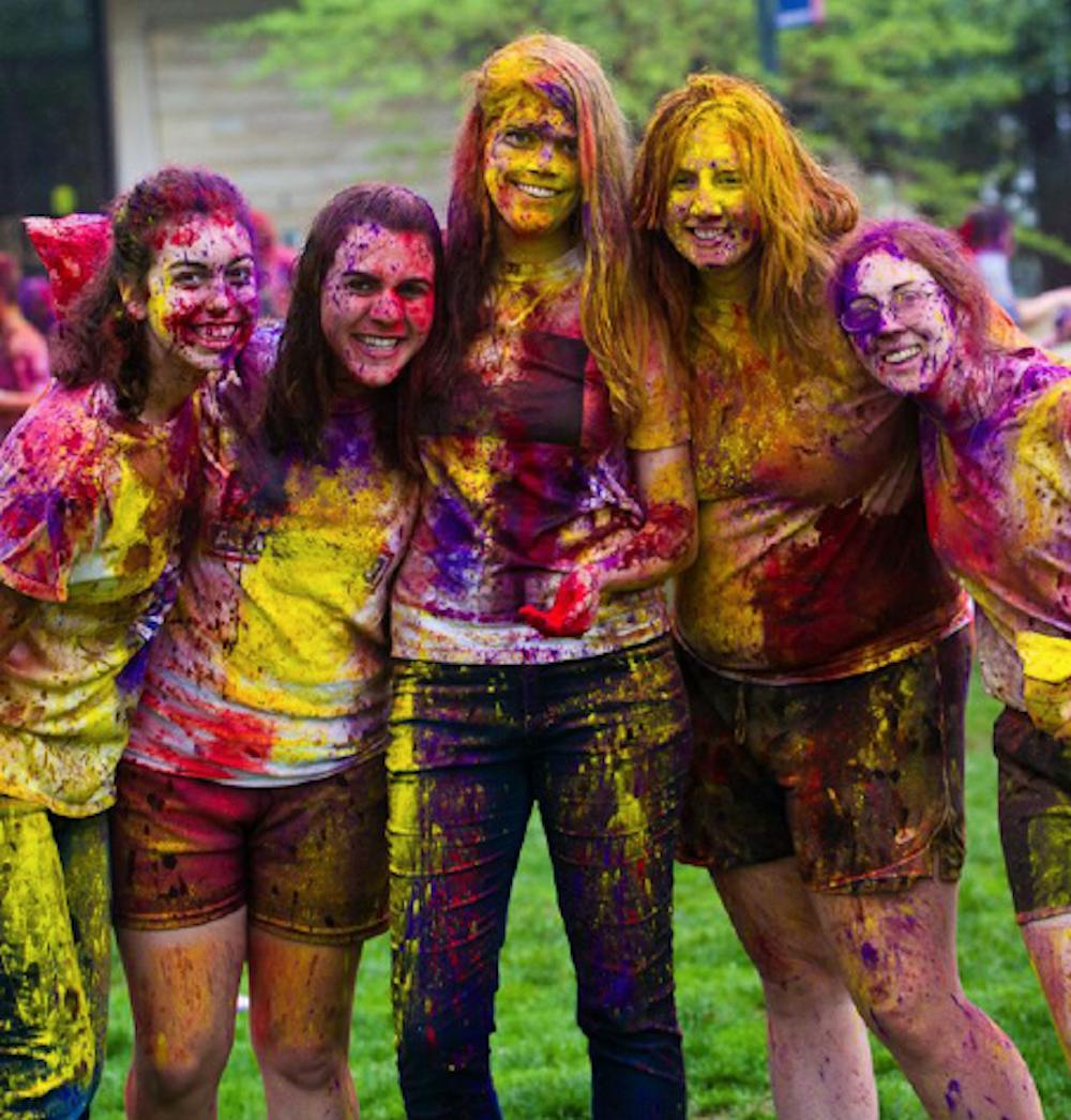Students celebrated Holi on the Quad on March 25. From left Jean Cornell, Adriana Ganci, Hannah Harry, Jacqui Langer and Ali Wentzell.