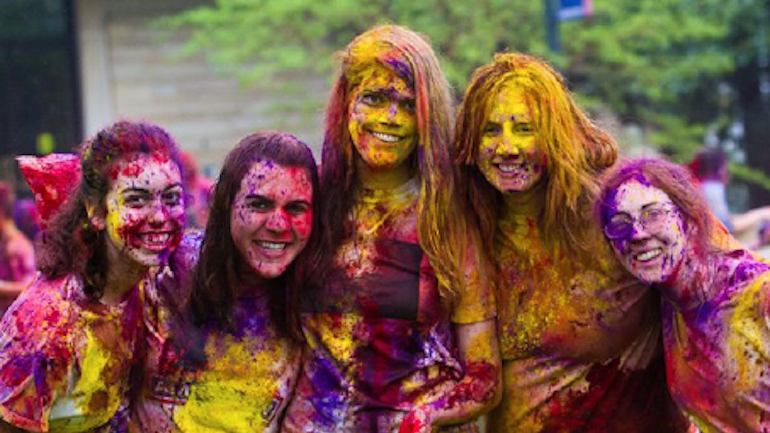 Students celebrated Holi on the Quad on March 25. From left Jean Cornell, Adriana Ganci, Hannah Harry, Jacqui Langer and Ali Wentzell.