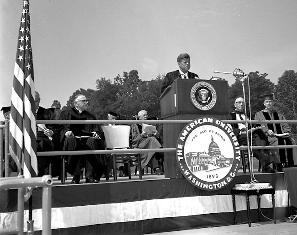 U.S. President John F. Kennedy gives his historic speech entitled \"A Strategy for Peace\" at Reeves Athletic Field during the 49th AU commencement. 