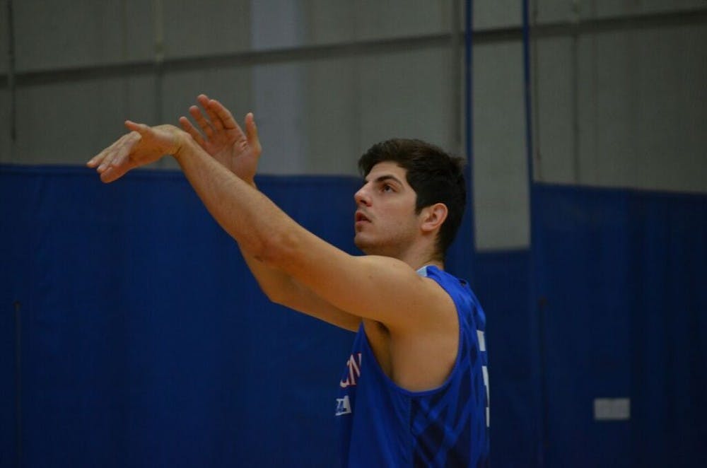 Senior forward Marko Vasic takes a shot during Media Day in October. Vasic scored 12 points against UMES.&nbsp;