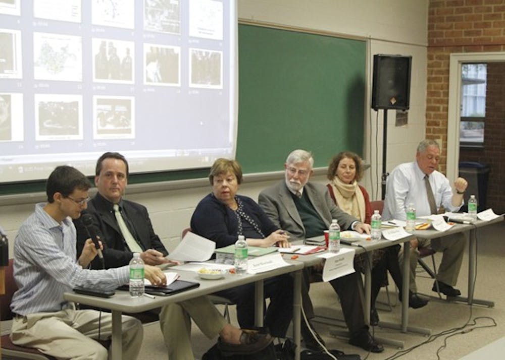 DIGGING FOR ANSWERS â€” Speakers at the educational panel included, from right, Steven Hirsh, the senior Spring Valley project manager at the Environmental Protection Agency, Beth Resnick, the director of health policy and management at the Johns Hopkins University and Dr. William Hirzy, the chair of the AU Chemistry Department. 