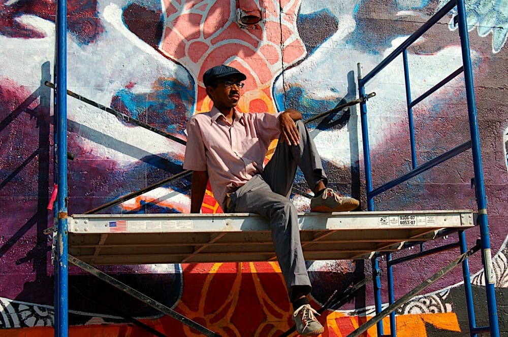 HIGH TIMES -- Joshua Mays, who hails from Philadelphia, brought his spray art to D.C. to inspire those who pass by his works. Mays' work is in the vein of one of the world's best-known in the genre, Banksy. His mural, along with those of the rest of the participants of Mural Jam, can be seen near the Rhode Island Metrorail stop.