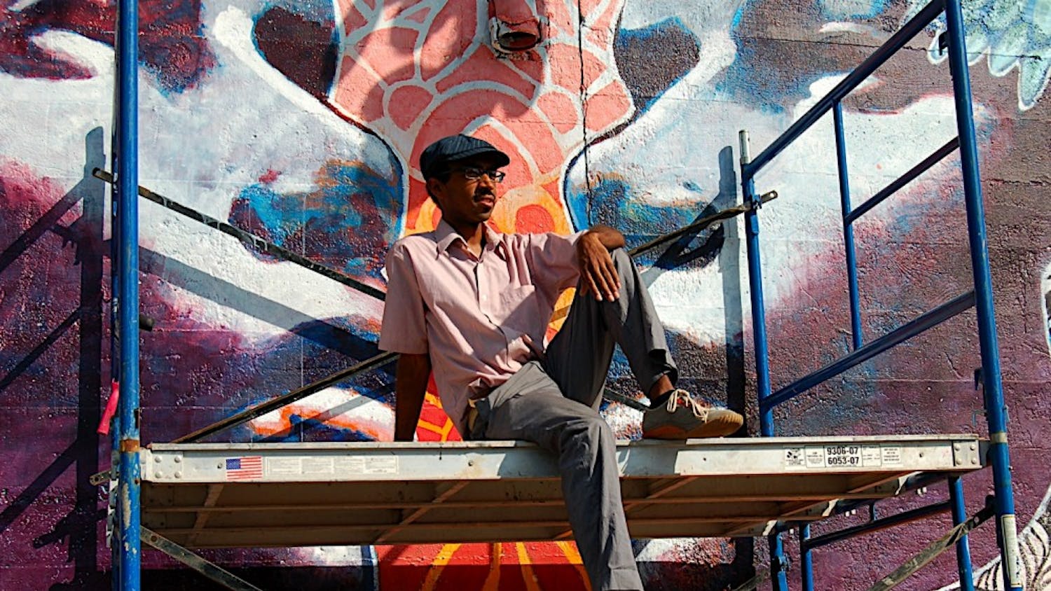 HIGH TIMES -- Joshua Mays, who hails from Philadelphia, brought his spray art to D.C. to inspire those who pass by his works. Mays' work is in the vein of one of the world's best-known in the genre, Banksy. His mural, along with those of the rest of the participants of Mural Jam, can be seen near the Rhode Island Metrorail stop.