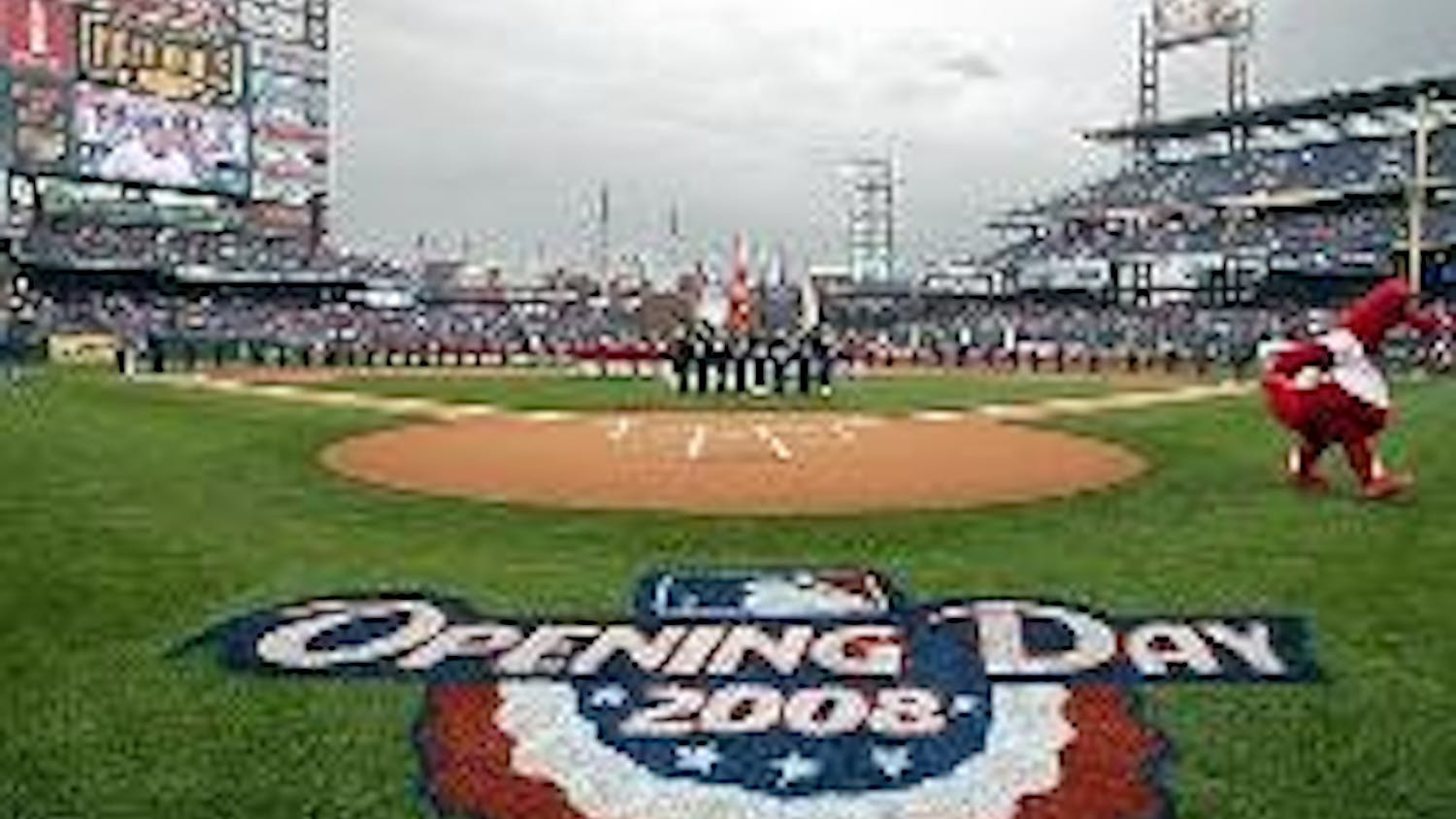 INAUGURAL PITCH - President Bush winds up to take the first offical pitch in the Nationals' opening day game. The president followed up his pitch by calling two innings of the game on ESPN.