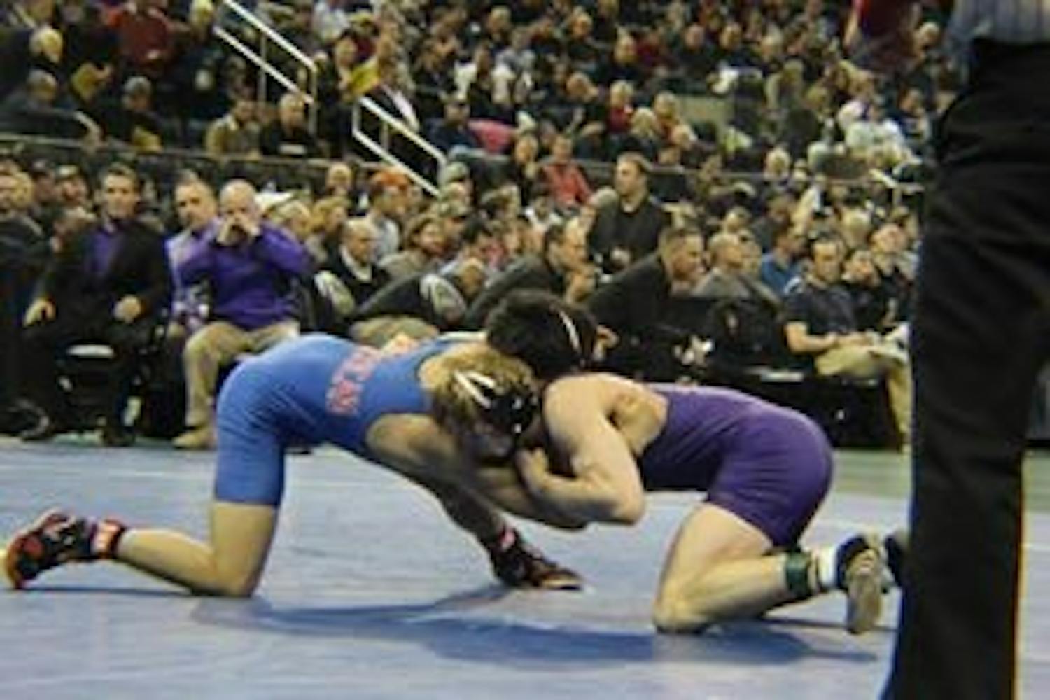 AU senior captain David Terao competes against Dylan Peters on Saturday morning in the consolation bracket.&nbsp;