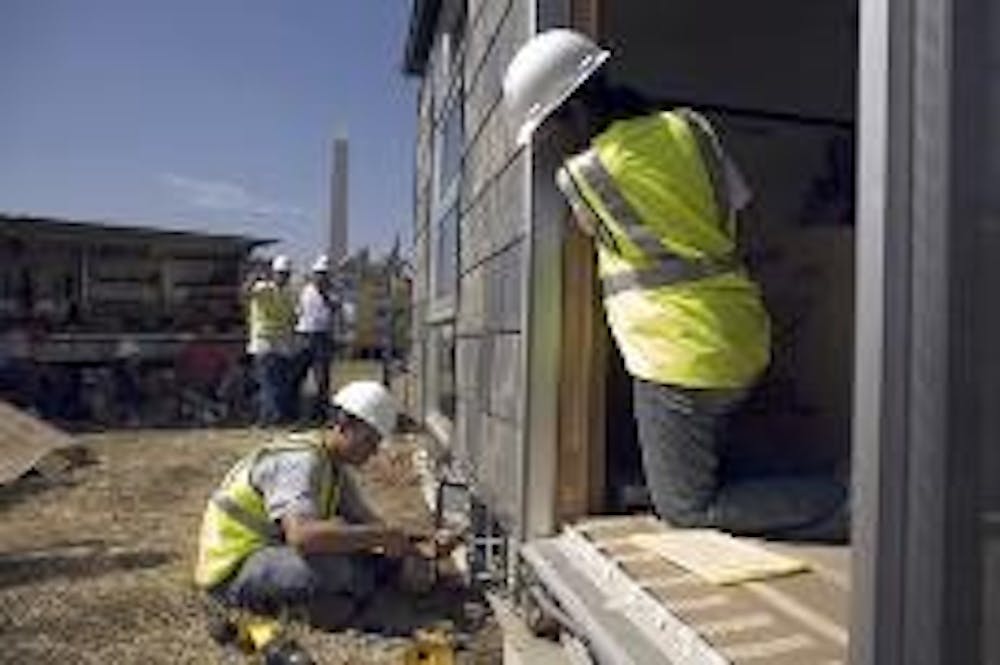 College teams build solar-powered homes on Mall