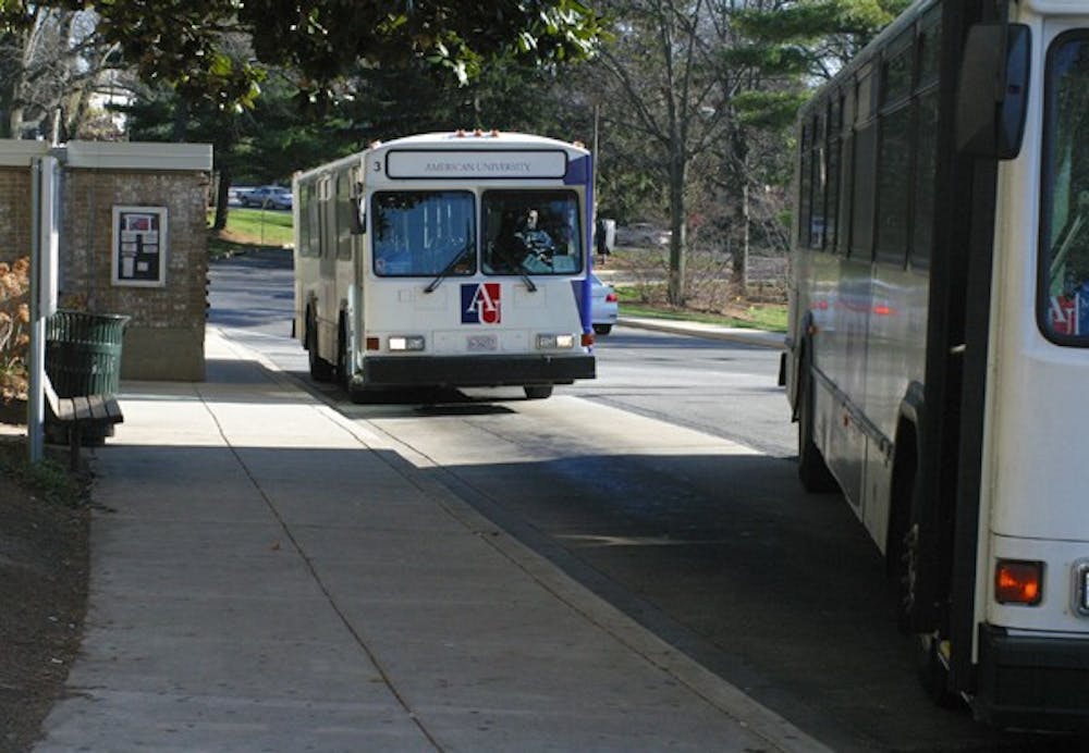 In this Dec. 6, 2006 file photo, shuttles idle in the South Side area of American University in Washington. (Kelly Barrett/Eagle File Photo)