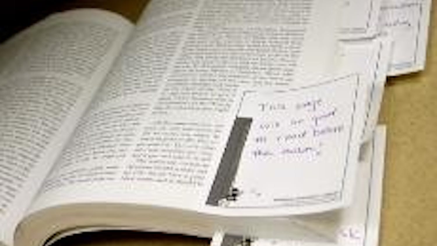 STICKY PAGES - Students can write notes on new sticky notes, available inside the library. The notes have fun, playful designs.