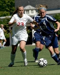 MOVE OUT - Junior forward Krystn Hodge shows off her skills on the field against her Mount St. Mary's opponent. Hodge has used these skills to help the Eagles gain their 9-5-1 record thus far in the season. Her latest goal was scored Oct. 14 against Lafay