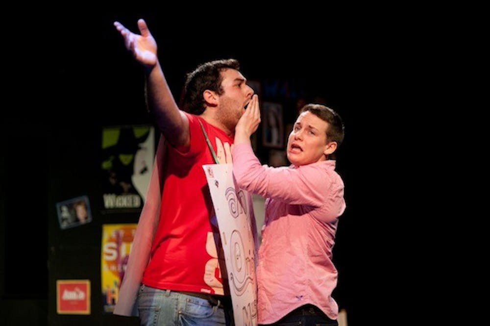 Jeff (Ryan Burke, left) and Hunter (Emmett Patterson, right) struggle with writer’s block in a dream sequence during “[title of show].”