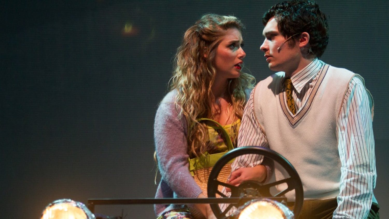 Julie Nolan and Jesse Saywell as Janet and Brad