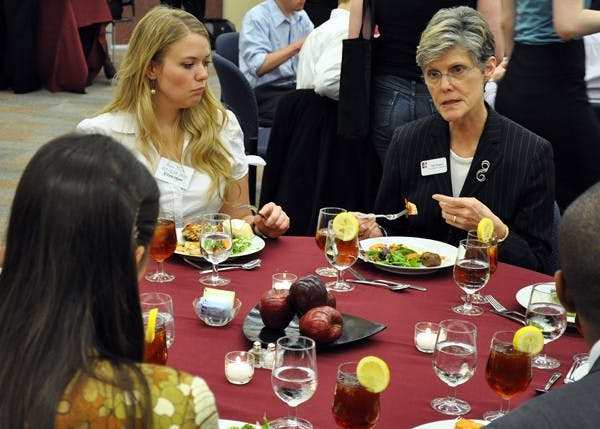 Bon appÃ©tit â€” At a Board of Trustees-sponsored event, six Trustees and seven administrators sat down to dinner with 24 students in Bender Library Thursday. Vice President for Campus Life Gail Hanson, right, spoke about campus issues with students in the Mudbox. 